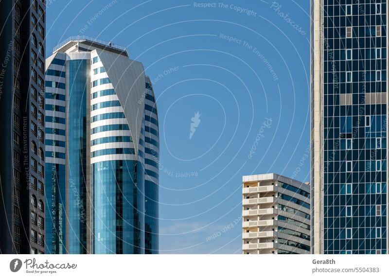 many windows and walls facade of a modern skyscraper without people abstract architectural background architectural pattern architecture backdrop blue building