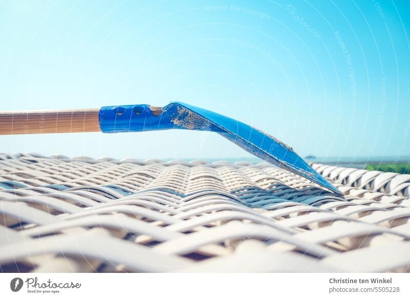 Longing for a vacation by the sea Beach chair North Sea holiday North Sea beach Shovel Blue sky Summer vacation Relaxation Beautiful weather Sunlight