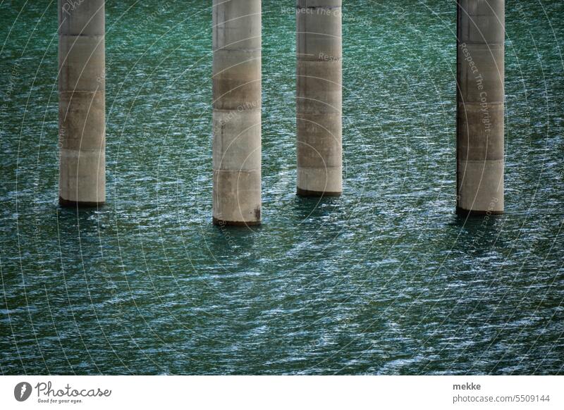 Pillars in the lake Water Lake columns piers Concrete props Mainstay Construction Ocean mountain lake stream of water Foundations Resource Ecological