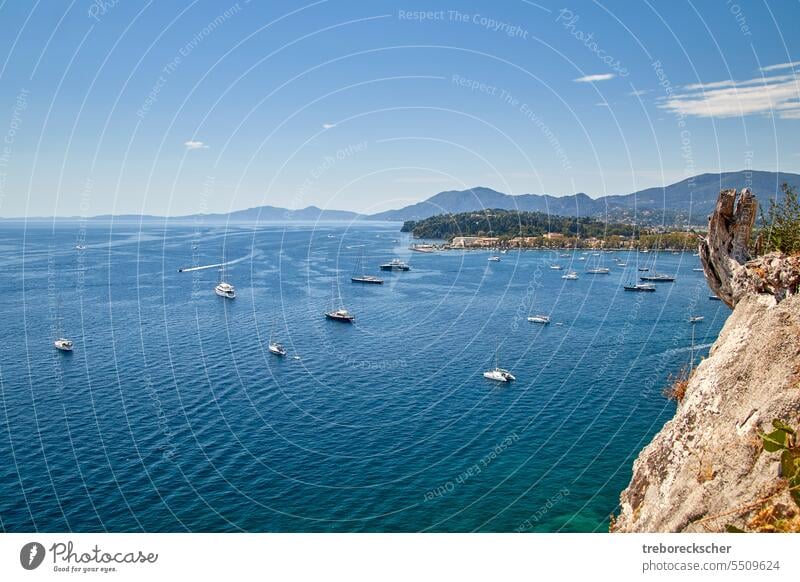 View over the picturesque bay of Corfu town of Kerkyra with many boats port sea greece island blue corfu mediterranean coast greek tourism water travel holiday