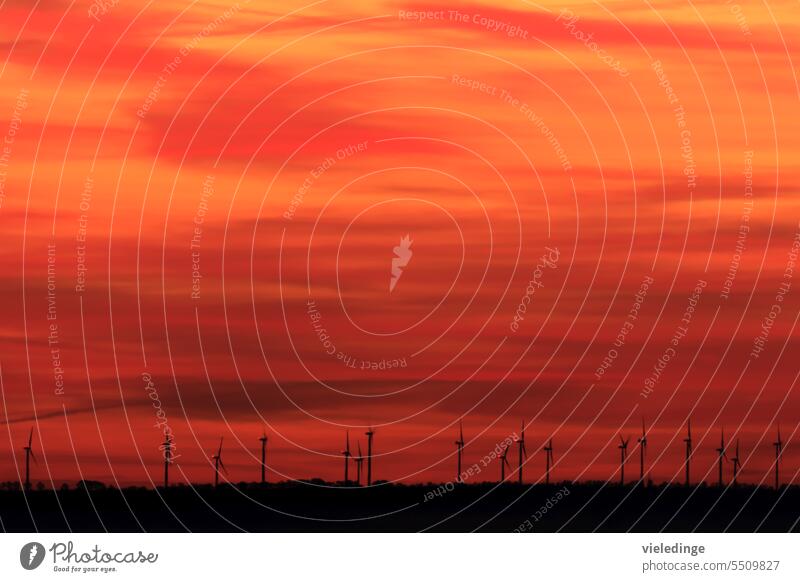 Sunrise over the Thuringian Basin Wind energy plant Pinwheel Wind turbines background wind farm Red Sky Blank space Renewable energy wind power windmills