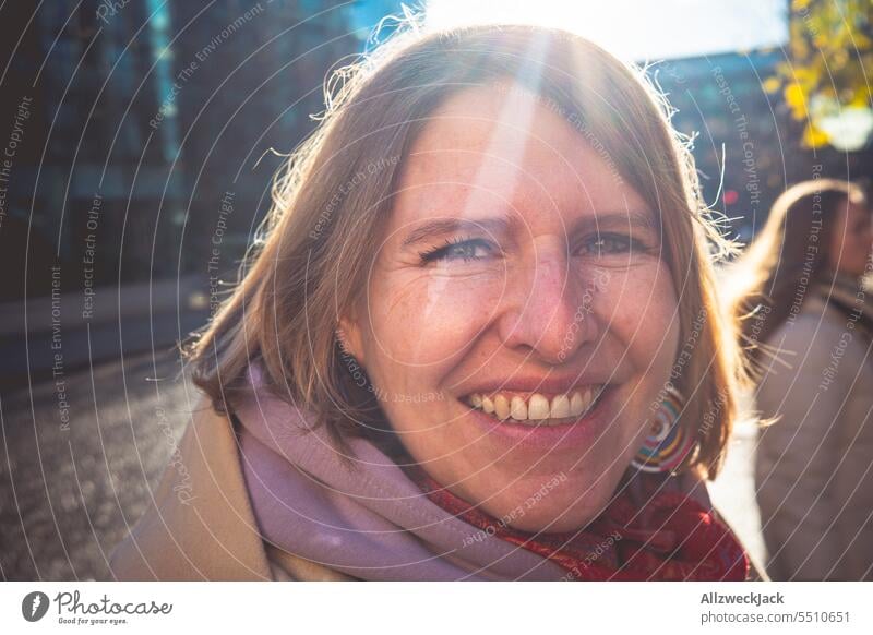 Portrait of smiling sympathetic blonde middle aged woman in winter Middle aged woman Congenial Smiling smiling woman portrait smile, expression, people