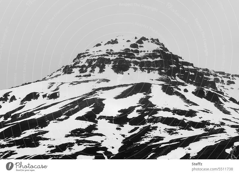 View of mountain with snow patches on Iceland Icelandic iceland trip Iceland picture Icelandic landscape Hill Snow melt Snow forms snowy Rock rock formation