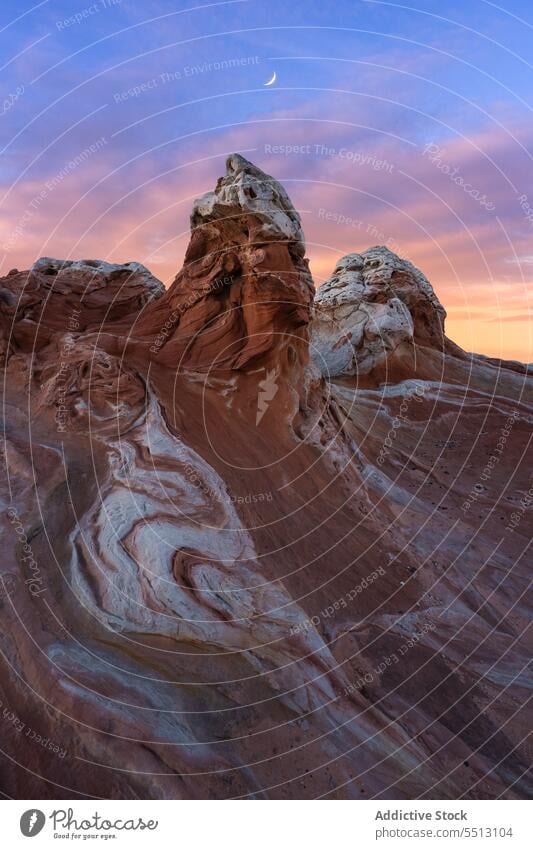 Rock mountain under bright evening sky with moon picturesque landscape nature purple ridge dusk twilight scenic colorful range night sundown winter peak sunset