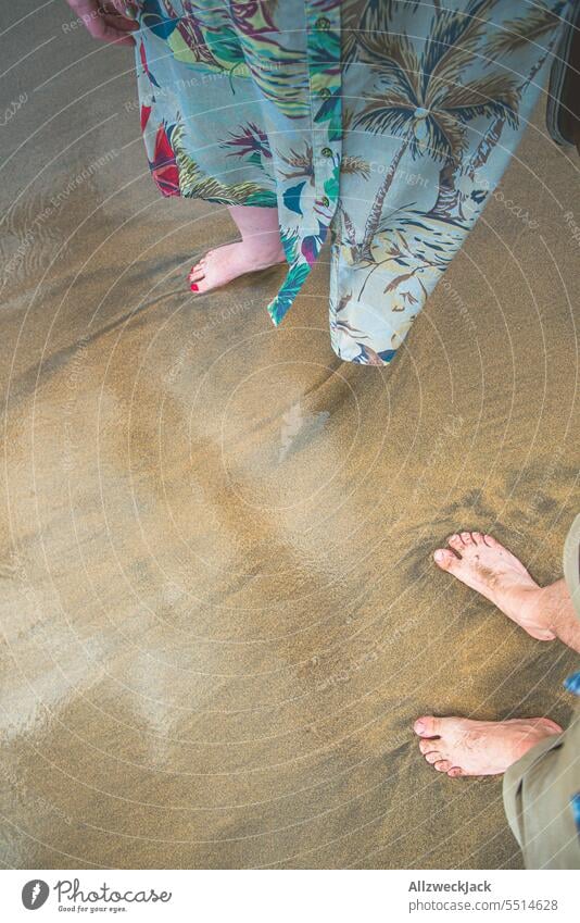 two pairs of legs with bare feet in water walking on beach portrait vacation Vacation mood Vacation photo Vacation destination travel voyage Travel photography