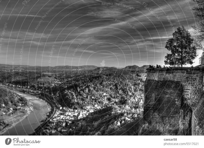 View from the Koenigstein fortress on the Saxon Switzerland stronghold saxony famous iconic landscape wilderness river elbe monochrome black and white sky