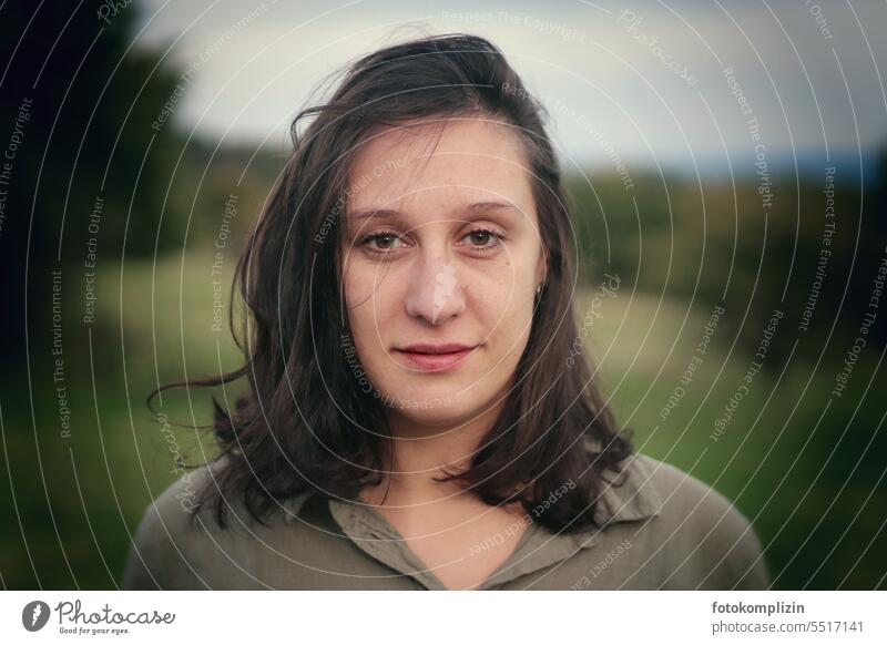 Portrait of a young woman portrait Woman Young woman Long-haired Feminine Face pretty Hair and hairstyles Face of a woman Brunette Looking naturally