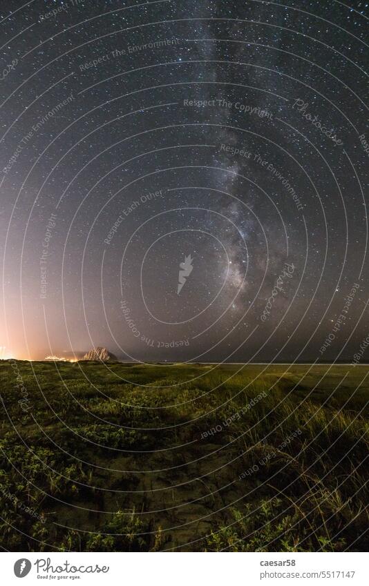 Starry night and the Milky Way above the US pacific coast galaxy stars space ocean light city milky way sky astronomy universe nature background science dark