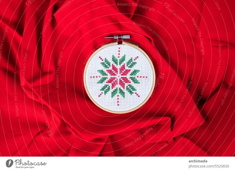 Handmade cross-stitch Christmas decoration art beautiful celebration christmas close up cloth copy space craft creativity decorative design diy fabric fest