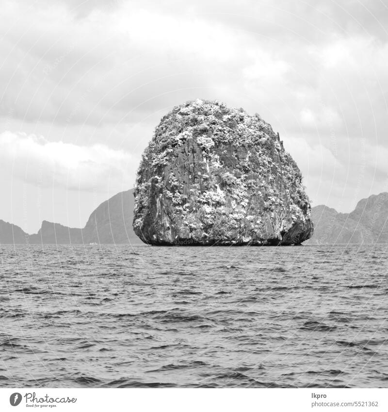 a view from  boat  and the pacific ocean philippines island sea tropical rock nido landscape nature beach sky water travel islands beautiful summer asia blue