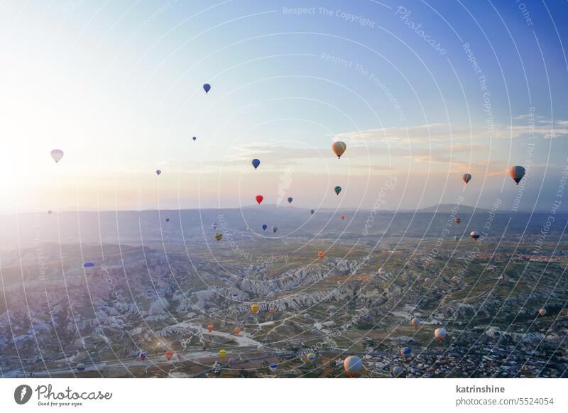 Beautiful morning scene with Hot air balloons flying over Cappadocia at sunrise, Turkey turkey love valley cappadocia flight landscape goreme park national