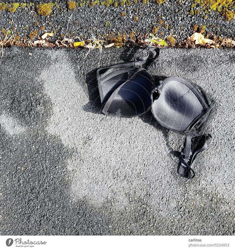 What happened here ? | Men(!?)loose bra on parking lot Bra Parking lot Woman Underwear felonies Crime scene Force prostitution summer night's dream streetwalk