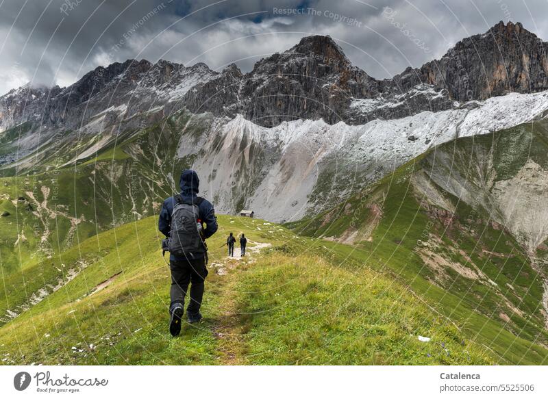 hiking in the alps Tourism Vacation & Travel Mountain vacation Hiking hikers path Alps Clouds Landscape mountain Peak mountains Sky Rock Environment Day Nature