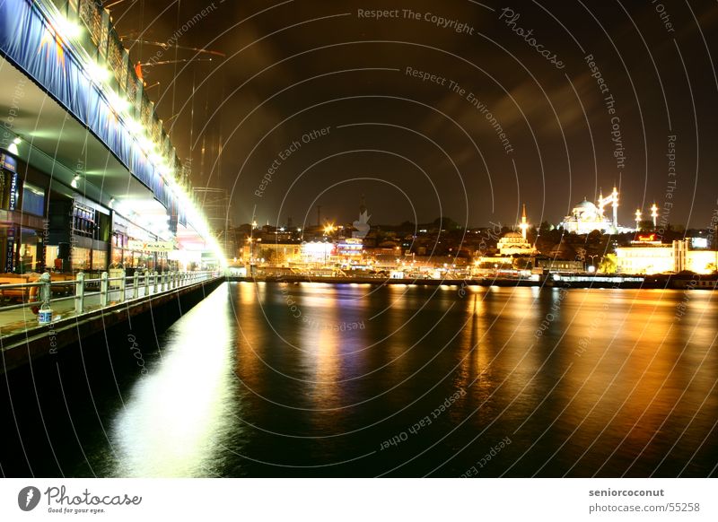 Istanbul Night Golden Horn Galata Bridge Mosque Town Near and Middle East Europe Asia Turkey Water long-term exposure Light occident