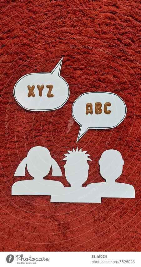 Dialog in speech bubbles ABC <=> XYZ Dialogue Speech bubble graphic contour Profile Silhouette Man Woman Child Girl Braids Fisur Copy Space Red Carpet high pile