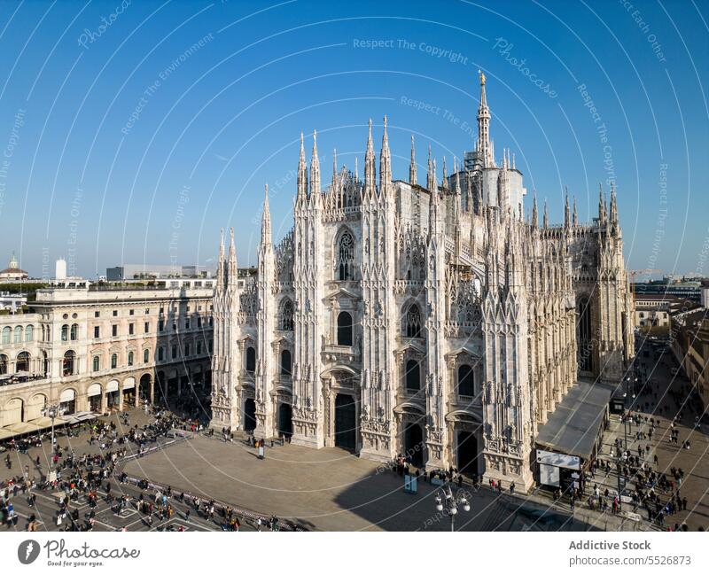 City with famous aged cathedral in sunshine cityscape basilica catholic landmark sightseeing milan tourism travel historic italy architecture attract sky