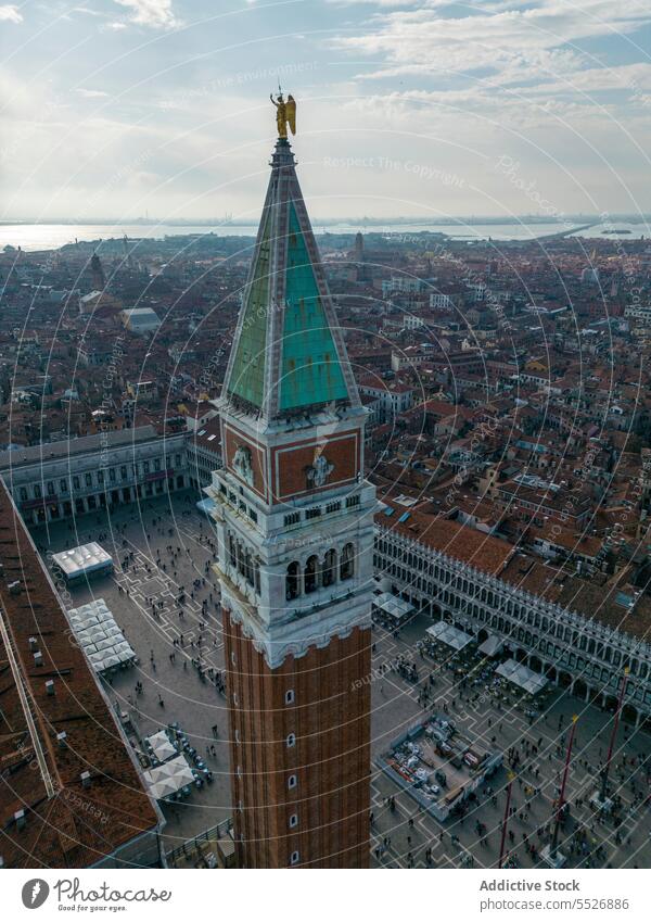 Drone view of church palace city and residential buildings tower architecture square historic exterior medieval culture basilica venice italy france europe