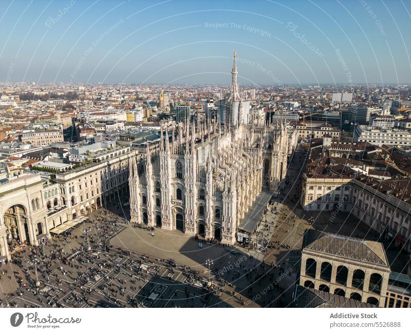 City with famous aged cathedral in sunshine cityscape basilica catholic landmark sightseeing milan tourism travel historic italy architecture attract sky