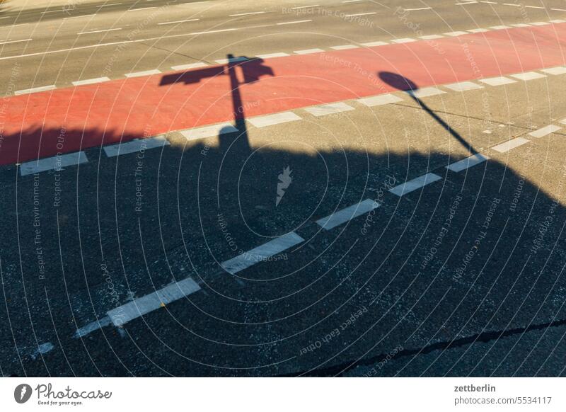 Shadow on the bike path Turn off Traffic light Asphalt car Highway Corner Lane markings Driving Bicycle Cycle path holidays locomotion Direct Main street Clue