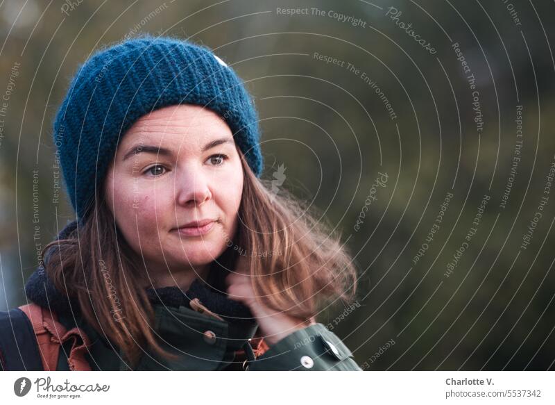 Wide land | Thoughtful | Portrait of woman with long hair and cap person Human being 1 Person Woman Adults portrait portrait of a woman Face Face of a woman