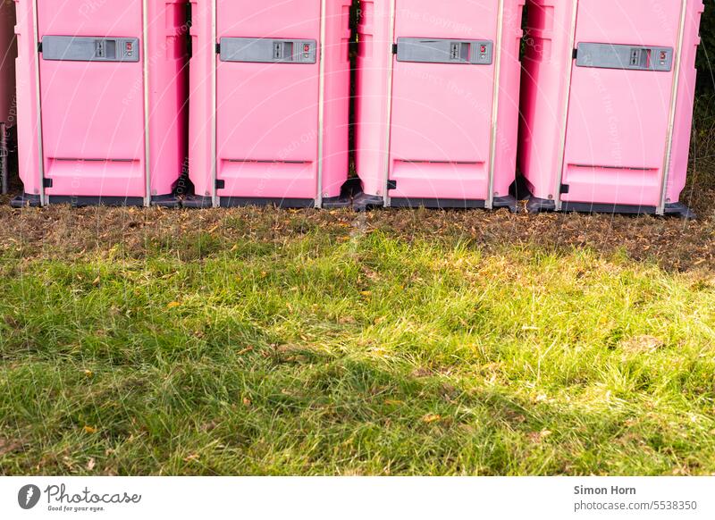 Row of pink toilet stalls Toilet Pink cottage notdurft public Public restroom LAVATORY Outdoors festival dixiecco Toilet cubicle Construction site