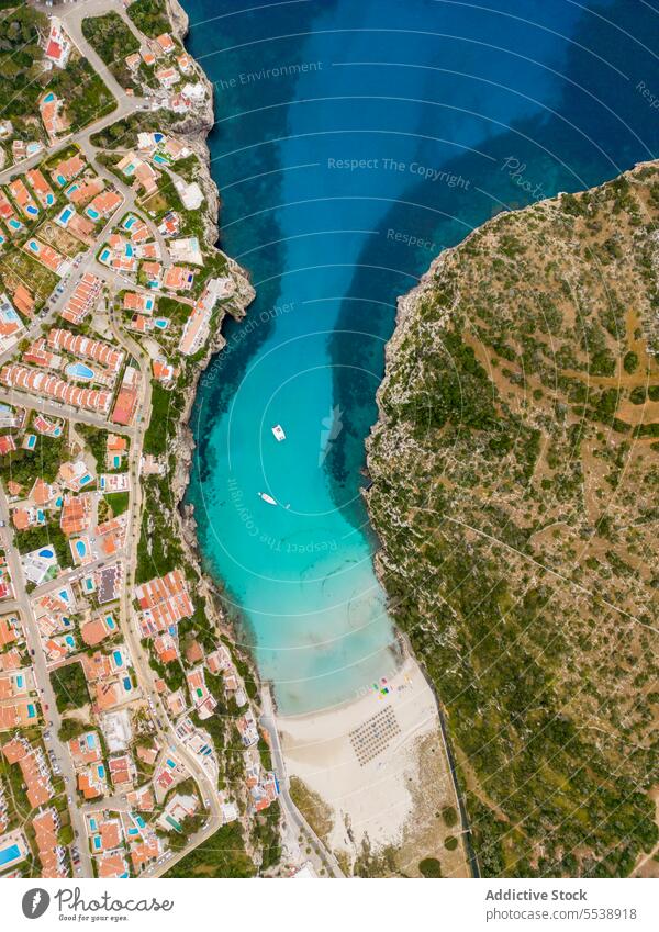 Aerial view of blue lagoon in island resort tropical shore paradise vacation shoreline landscape scenic ocean turquoise coast scenery idyllic amazing tranquil