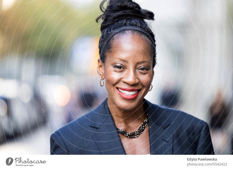 Portrait of a confident mature businesswoman in the city people downtown joy urban black natural attractive black woman happiness street happy modern