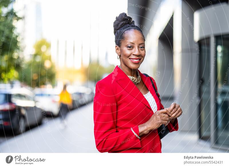 Portrait of a confident mature businesswoman in the city people downtown joy urban black natural attractive black woman happiness street happy modern