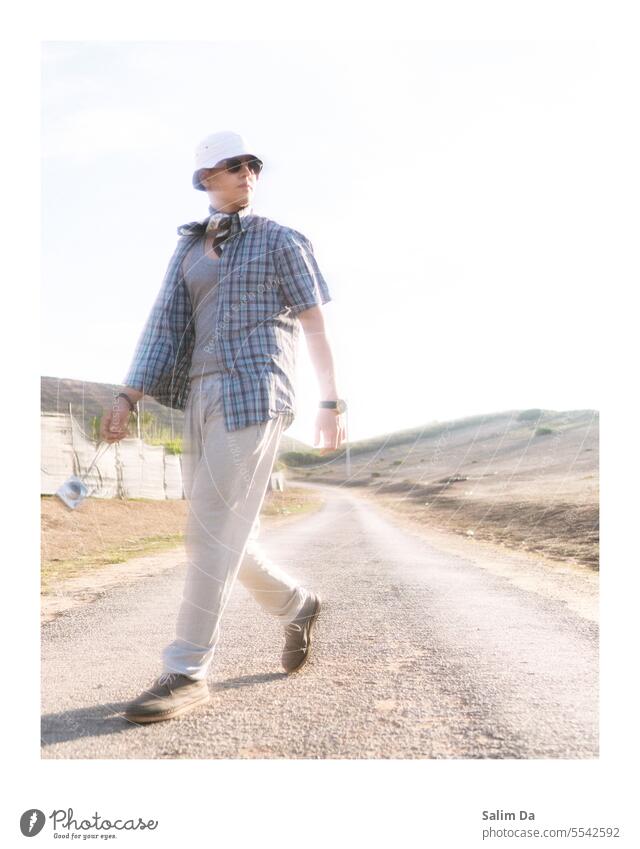 Aesthetic glowing portrait of a road tripping stylish man Glow Capture Aesthetics photo Model handsome outfit trendy casual Style aesthetic Art Fashion