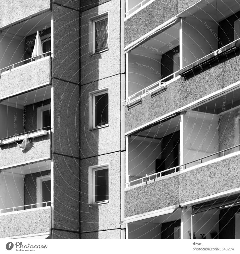 Balcony with parasol Facade dwell Sunshade Architecture Window Manmade structures Building House (Residential Structure) High-rise Flat (apartment)