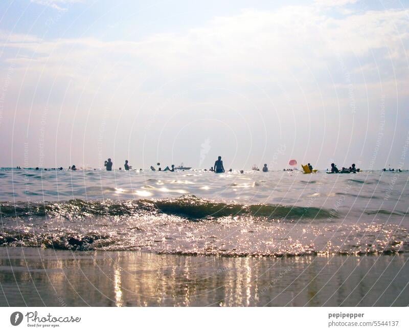 On the beach - beach life photographed from frog perspective with back light Beach Ocean Sand Water Waves coast Sky Horizon Nature Vacation & Travel