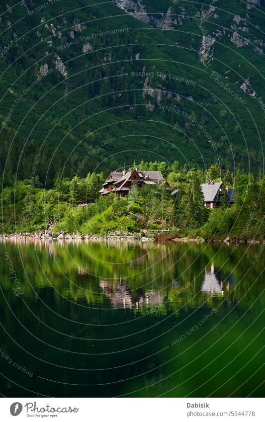 Cabin in mountains with green forest near lake cabin national park landscape tourism morskie oko sea eye tourists nature poland tatra zakopane outdoors