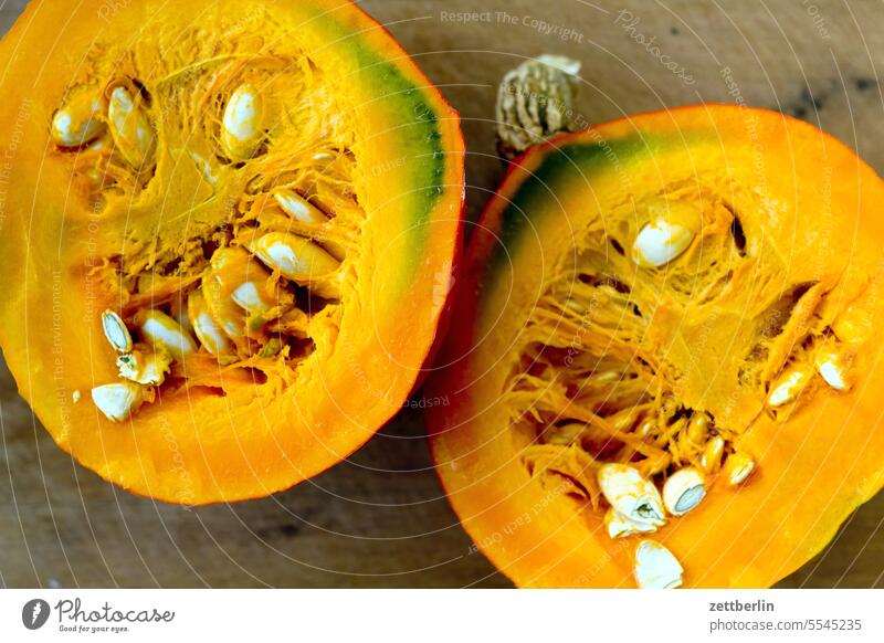 Two pumpkin halves Harvest Eating Meat Fresh Fruit Fruit flesh Vegetable Cut inner Core boil Kitchen Pumpkin Pumpkin seed fruit cut self-catering Dish