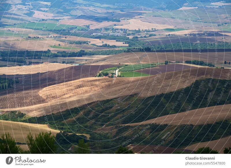 Rural landscape in Tuscany near Pienza Europe Italy Montefollonico Siena agriculture color country day farm field flower hill house nature photography rural