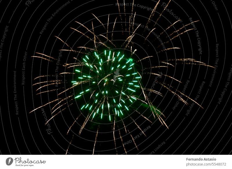 Fireworks. Colorful celebration fireworks isolated on a black sky background. From below, shot of wonderful and vivid fireworks exploding. Burst. colorful light