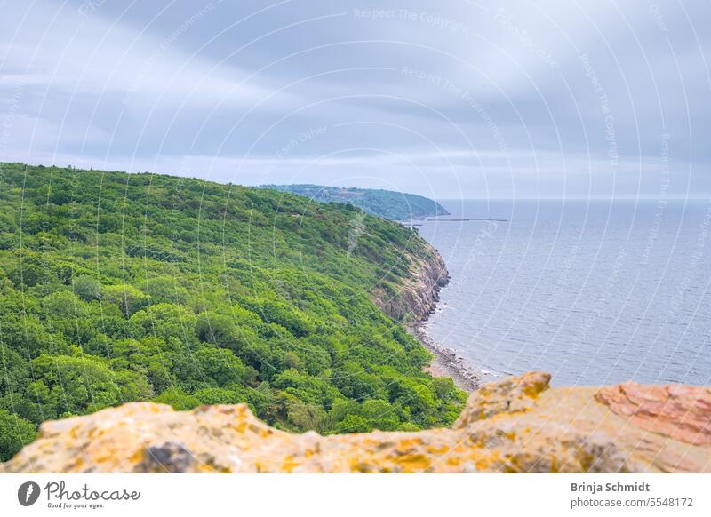 Wide view along the north coast of Bornholm from Hammershus castle ruins denmark attraction construction classical monument architectural tower famous cloud