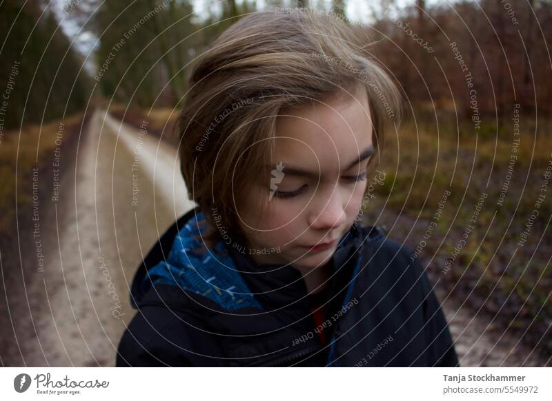 Thoughtful child in forest Child Forest Meditative sad Sadness reflectiveness Autumnal off long way portrait portraits Facial expression faces Face Head