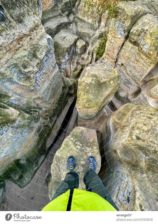 In search of the right path off right way Rock Rock group Sandstone Lanes & trails Klusfelsen Sanctuary Exterior shot person Downward Colour photo Day feet Maze