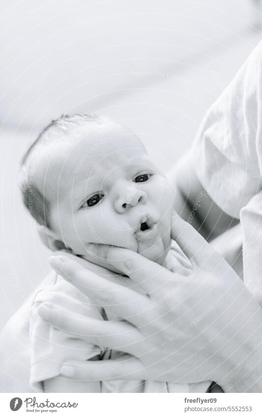 Portrait of a newborn making funny faces baby portrait copy space parenthood motherhood innocence life labor young boy happy small pregnancy little childhood