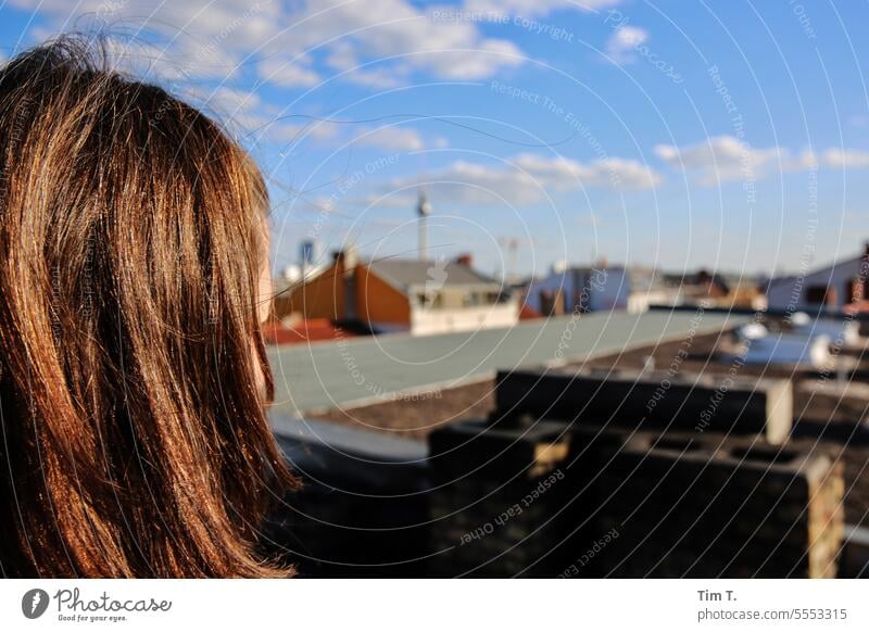 Girl with long hair on the roof in Berlin Television tower Roof Town Capital city Downtown Berlin TV Tower Sky Exterior shot Day Skyline Landmark Architecture