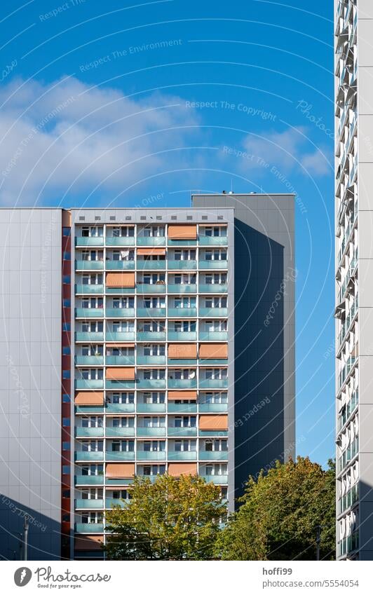 Prefabricated building with sky blue Prefab construction Tower block Exterior High-rise Block High-rise facade Symmetry Facade Balcony Architecture Town