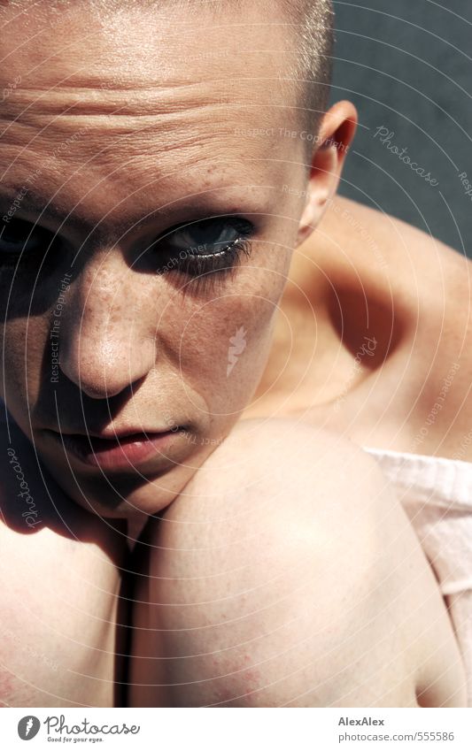 Very close portrait of a young woman with very short hair and freckles Young woman Youth (Young adults) Face Knee 13 - 18 years Child Top Blonde Short-haired