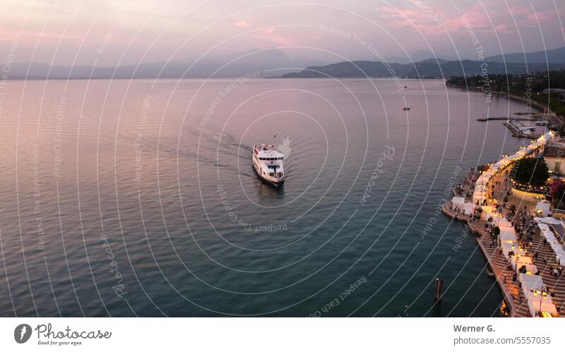 Passenger ship from above in the evening on Lake Garda Dusk Aerial photographs Lazise