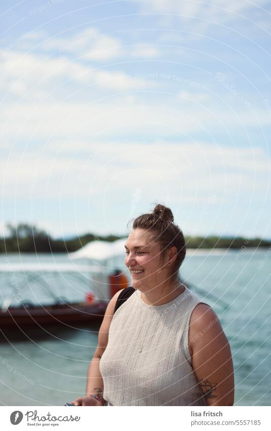 LAUGHING WOMAN - TRIP - SUMMER Woman 30 - 40 years Chignon Laughter Summer Ocean Water boat Adults Colour photo Closed eyes tattoos Trip Vacation & Travel