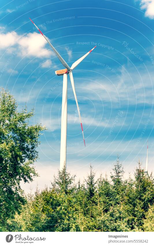 Rotor and rotor blades of a wind turbine up close Rotor blades Wind energy plant Blue Nearby Close-up ecology Electric Electricity Energy technique Environment