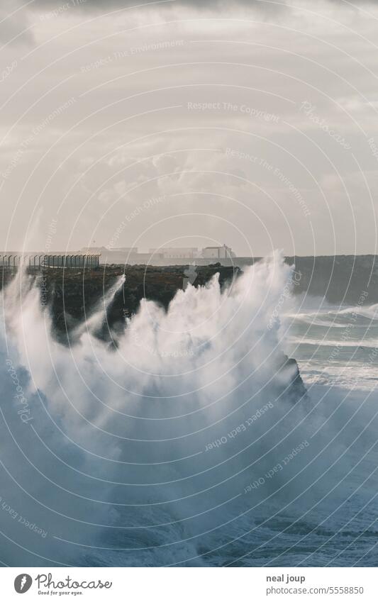 Waves explode on the cliffs of the Algarve Nature Ocean Autumn Gale coast Wind Water Rock steep coast Exterior shot Landscape Cliff Far-off places Deserted