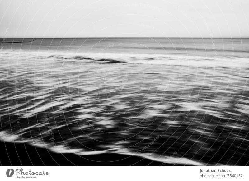 View with motion blur of the Baltic Sea from Warnemünde Baltic coast Ocean Waves Longing Autumn Off-Season travel vacation Warnemuende Sky Clouds