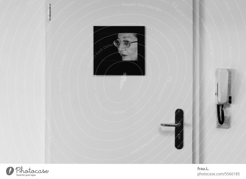 Door with intercom and photo Woman portrait Face Old Eyeglasses see eyes Mother beloved present door Memory