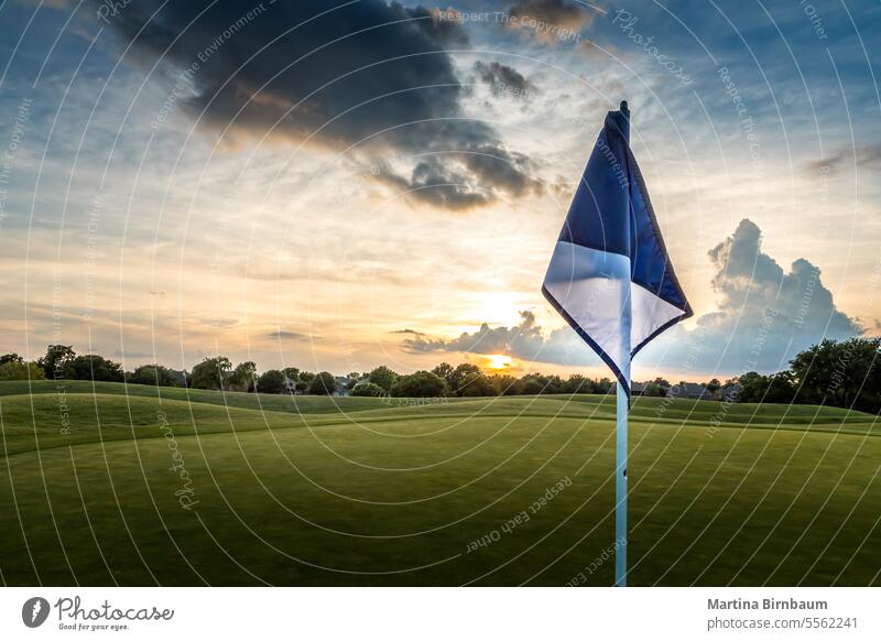 Flag on a Texan golf course at sunset texas flag landscape sport field blue hole green sky sunny grass summer play punta golfing tree palm republic outdoor