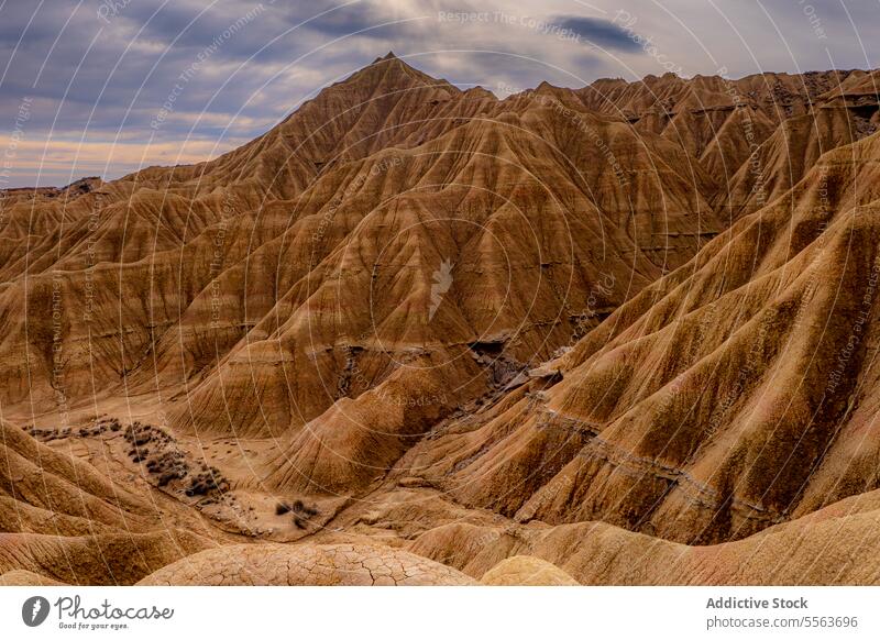 Stone desert hills and canyons mountain surface bardenas reales spain navarra stone glade valley view coast picturesque landscape nature pond scenic travel